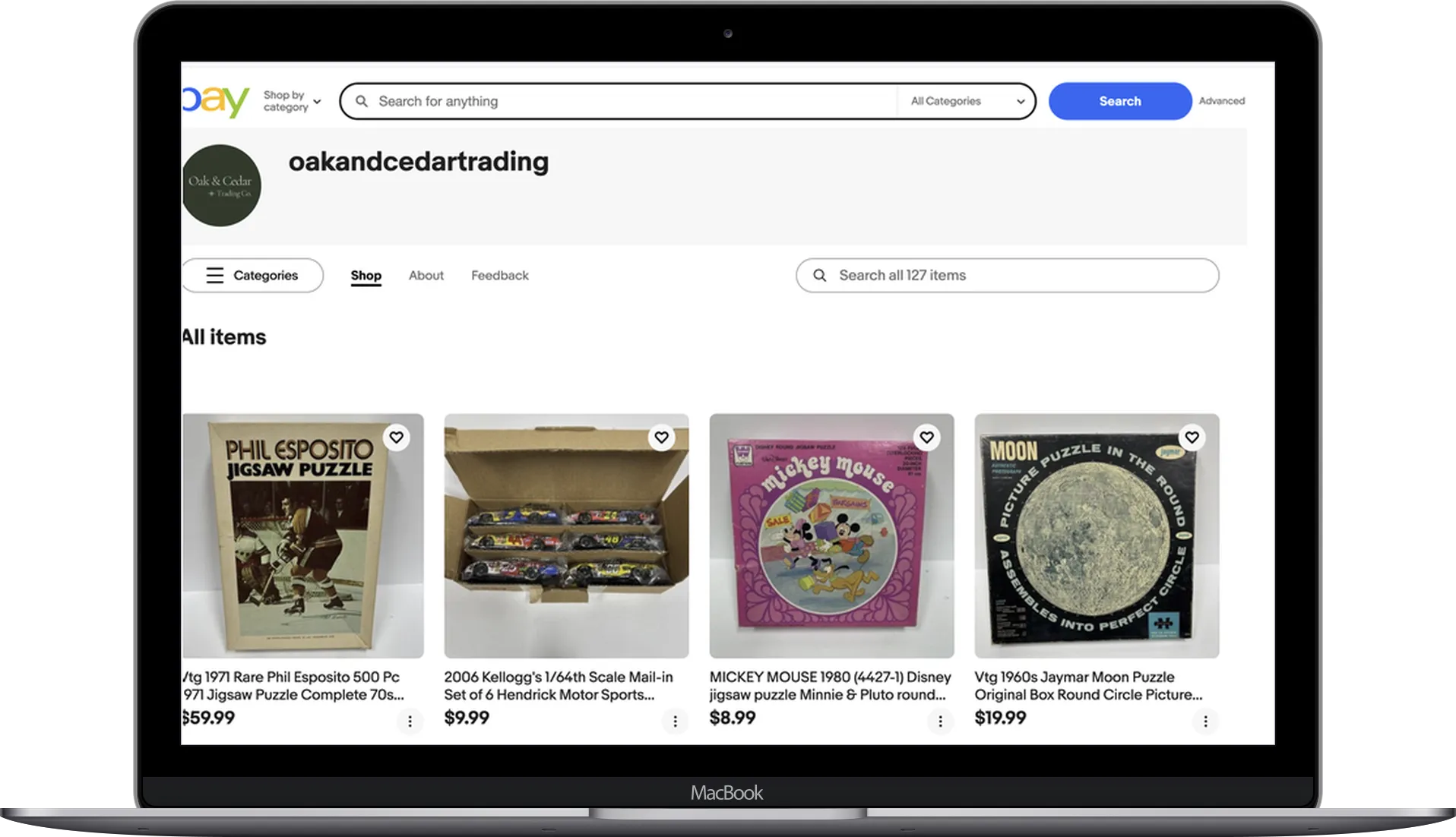 Oak & Cedar Trading's eBay store on a laptop